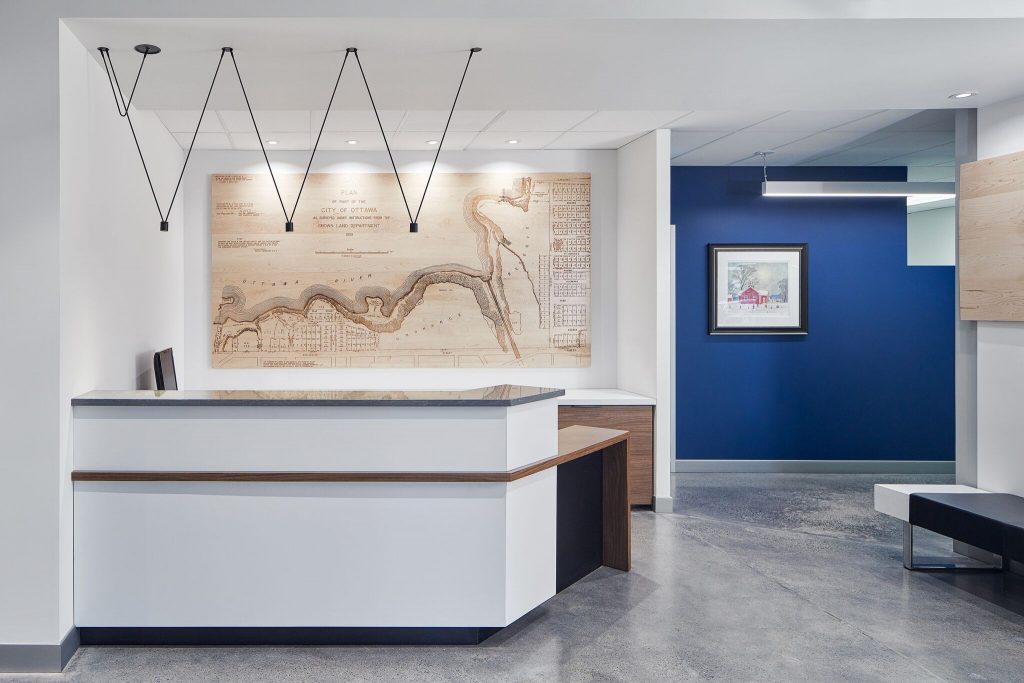 Reception desk lighting at Annis O’Sullivan Vollebekk, Kanata