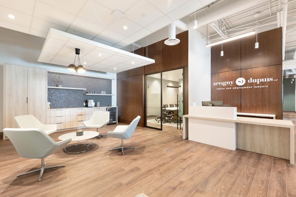 Reception lounge lighting with pendant fixture at Sevigny Dupuis LLP, Nepean