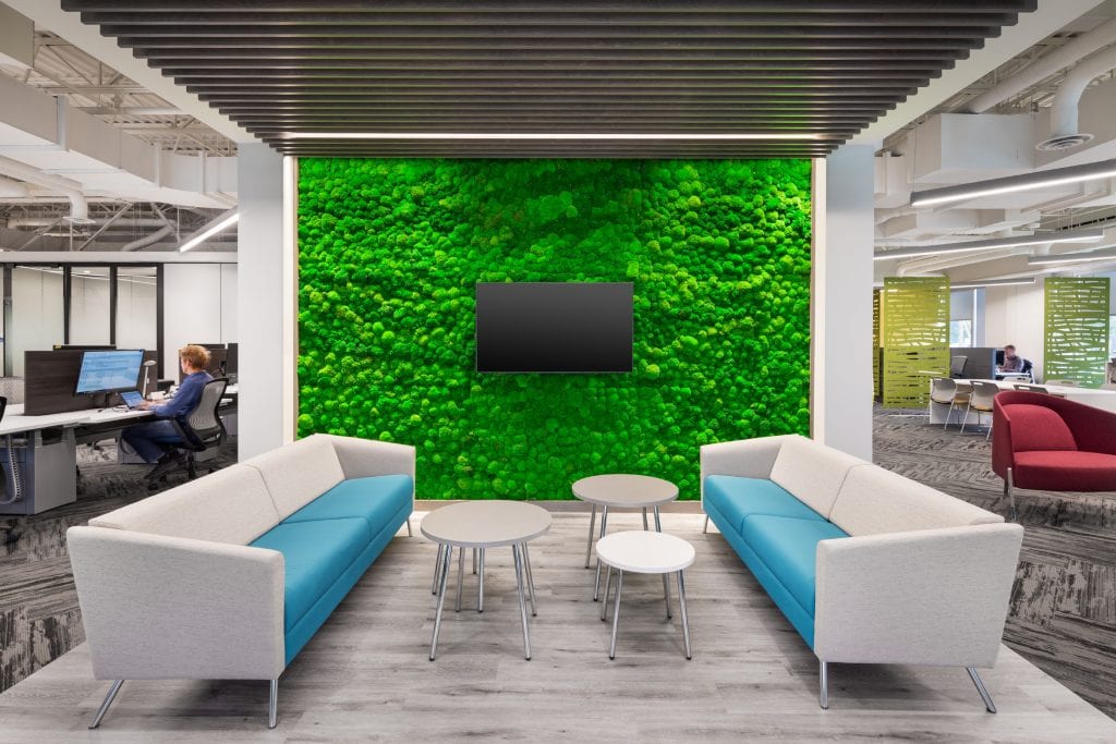 Lounge lighting with linear ceiling fixtures at GCworkplace Co-Working Space, Gatineau