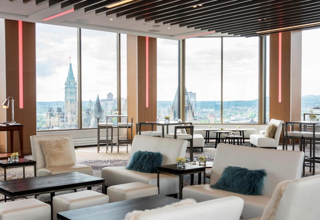 Lounge lighting with vertical linear fixtures overlooking city view at Venue TwentyTwo, Ottawa