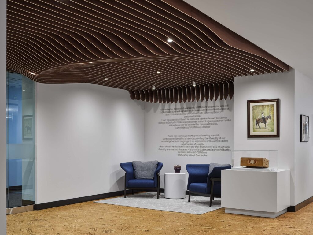 Lounge lighting with wood ceiling feature at Office of the Commissioner of Indigenous Languages (OCIL), Ottawa