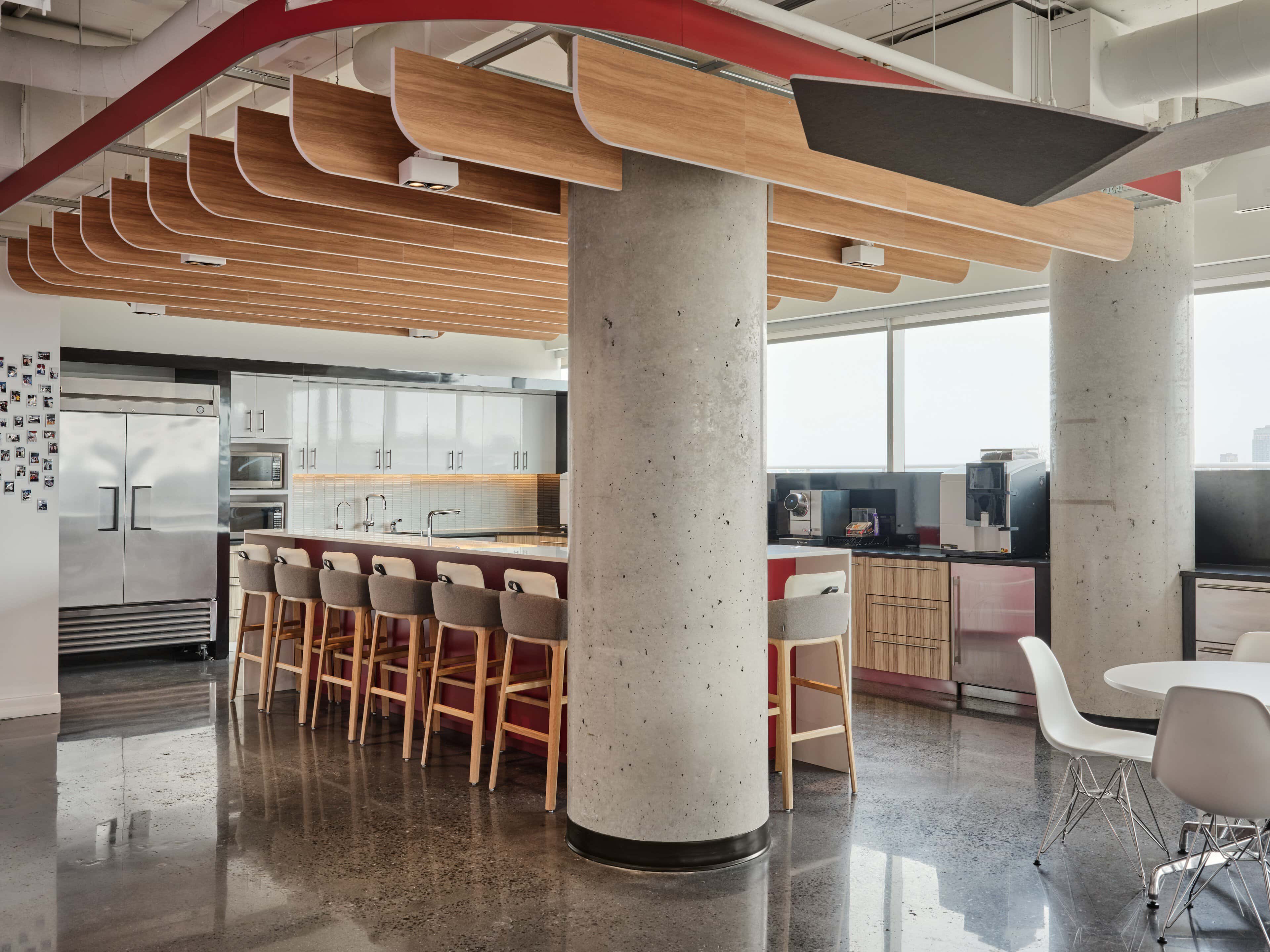 Kitchen island beneath the wood-slat ceiling at CIRA, Ottawa